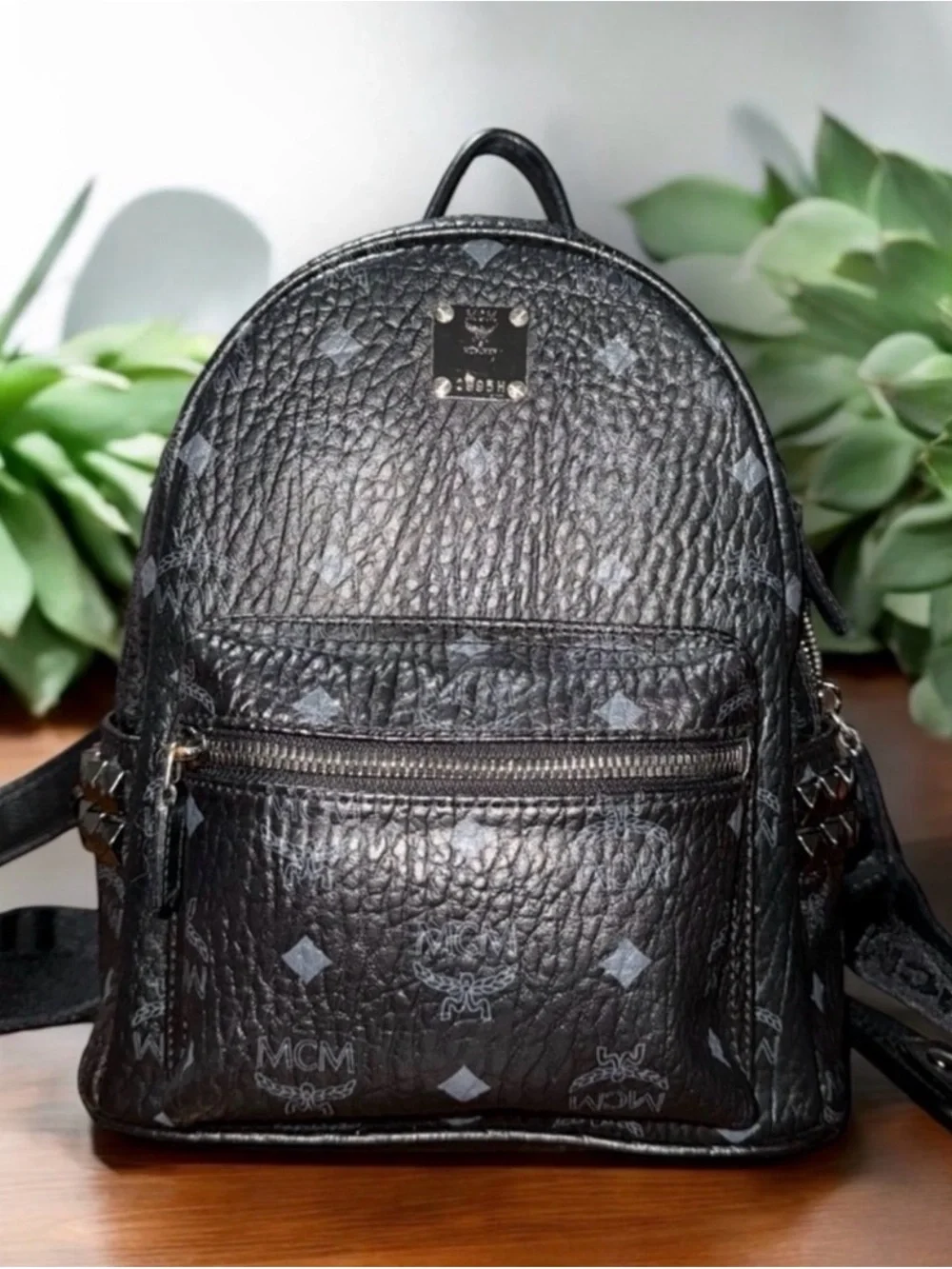 MCM Black Logo-Stamped Leather Mini Backpack with Stud Details